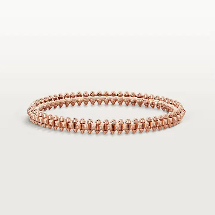Ensemble deux pièces de la collection «Clash de Cartier»  bracelet et boucles d'oreilles créoles