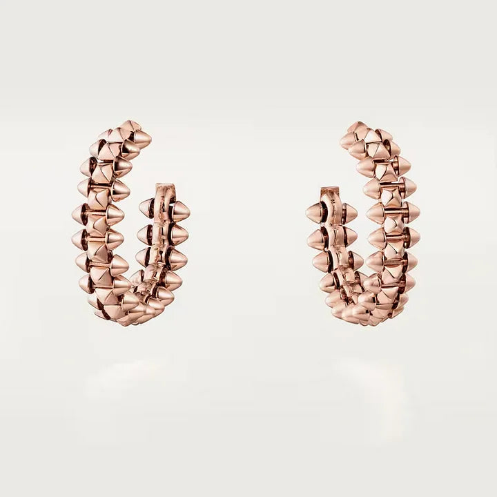 Ensemble deux pièces de la collection «Clash de Cartier»  bracelet et boucles d'oreilles créoles