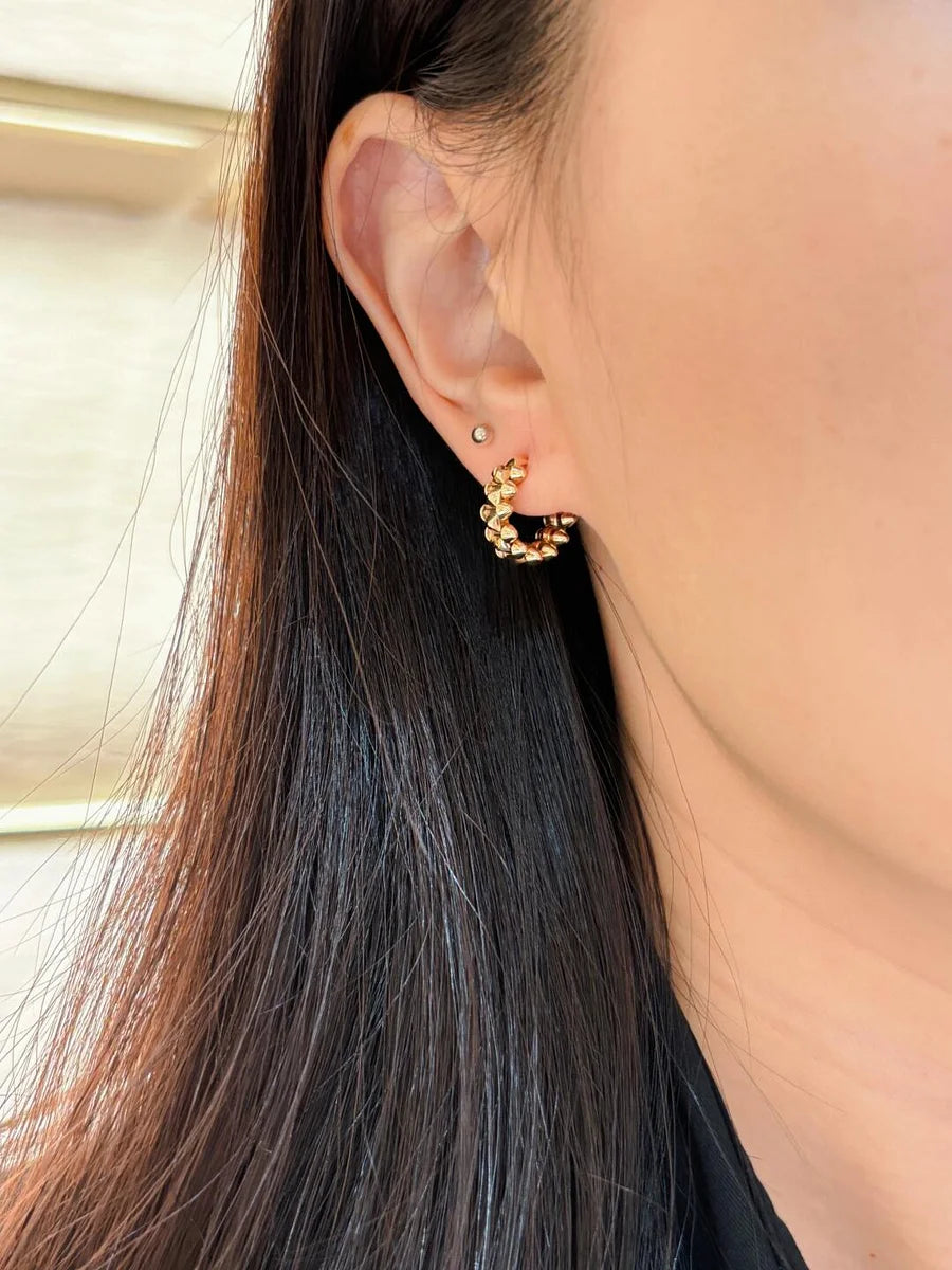 Ensemble deux pièces de la collection « Clash de Cartier » bracelet et boucles d'oreilles