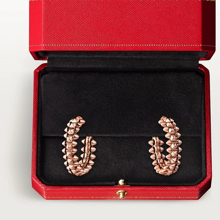 Ensemble deux pièces de la collection «Clash de Cartier»  bracelet et boucles d'oreilles créoles