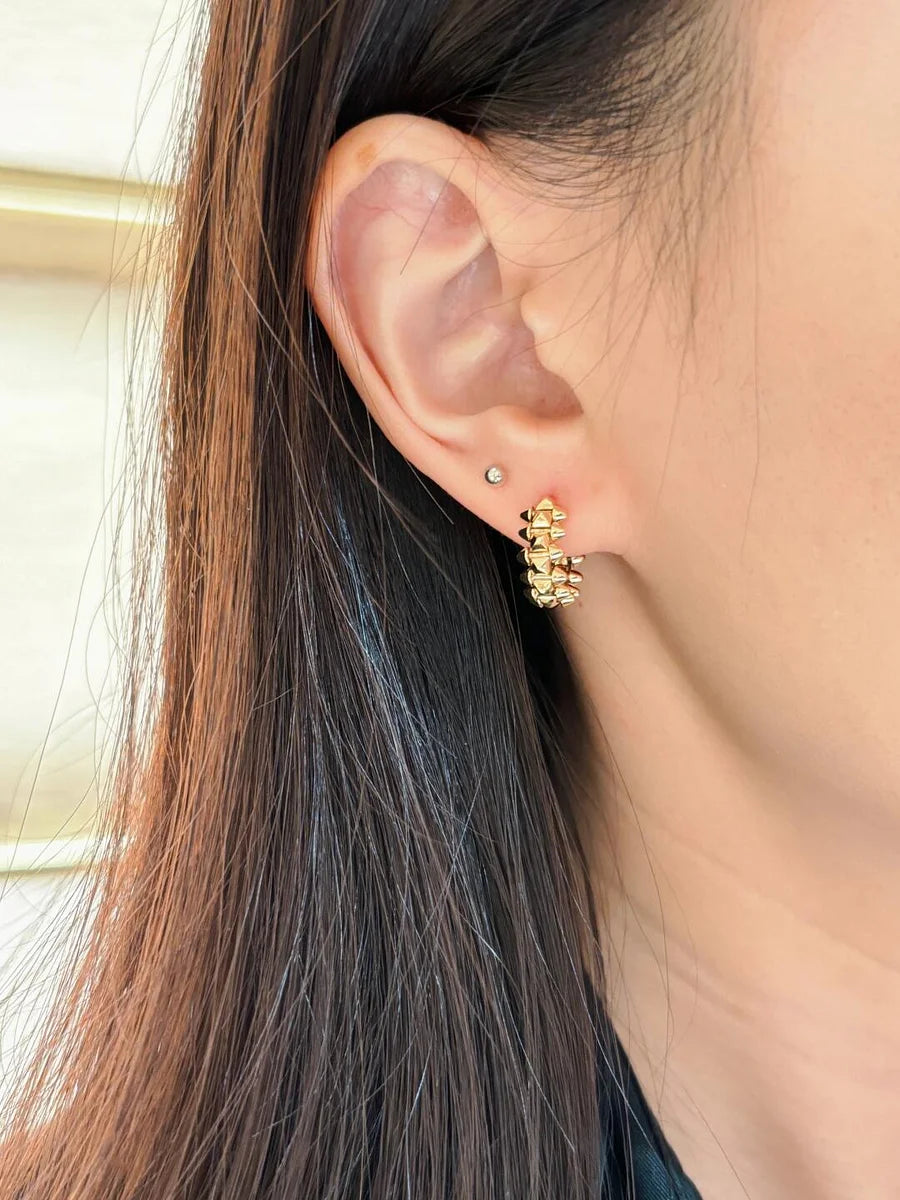 Ensemble deux pièces de la collection « Clash de Cartier » bracelet et boucles d'oreilles