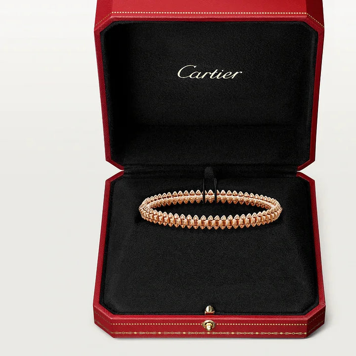 Ensemble deux pièces de la collection «Clash de Cartier»  bracelet et boucles d'oreilles créoles