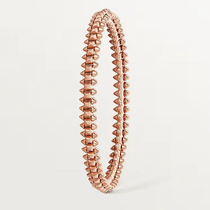 Ensemble deux pièces de la collection «Clash de Cartier»  bracelet et boucles d'oreilles créoles