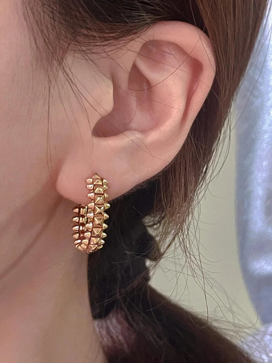 Ensemble deux pièces de la collection «Clash de Cartier»  bracelet et boucles d'oreilles créoles